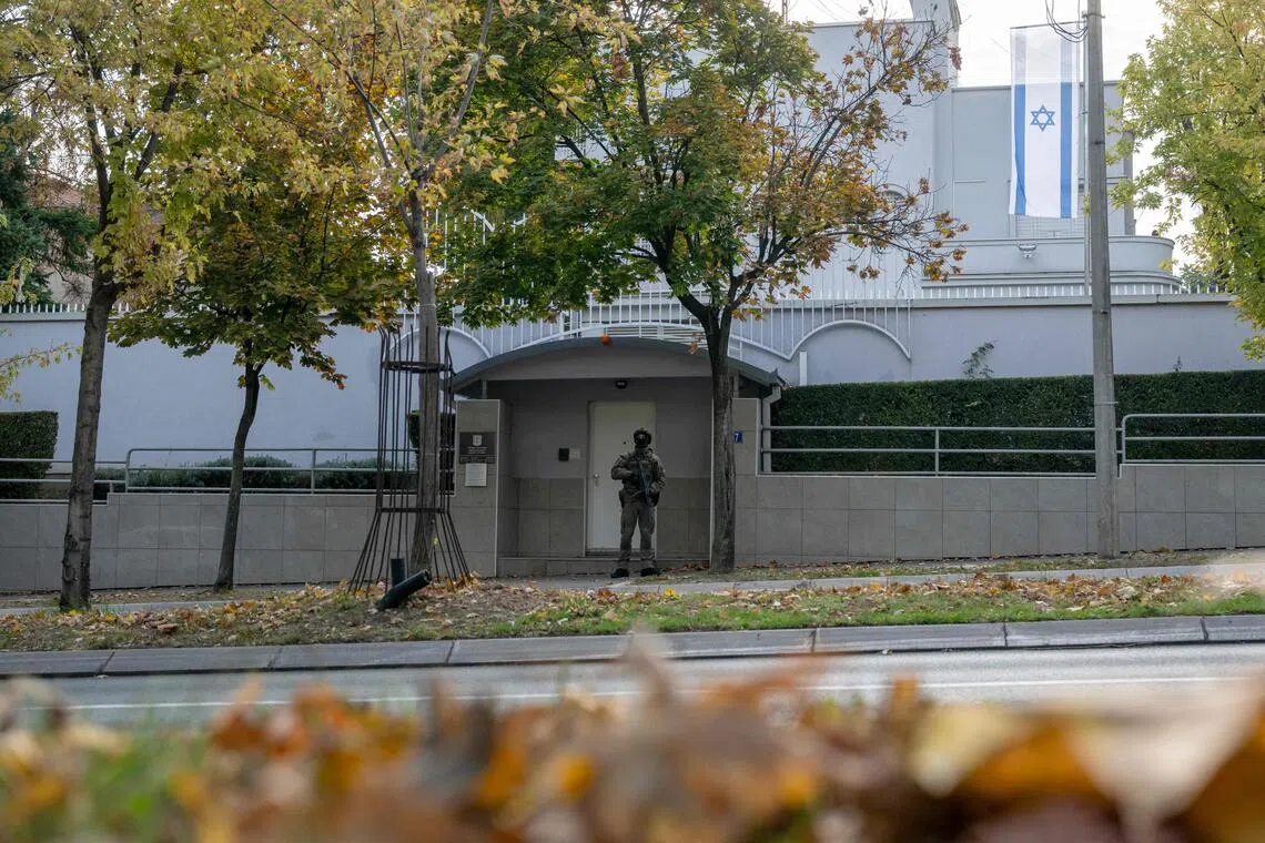 A member of Serbia’s Gendarmerie guarding the entrance to the Israeli embassy in Belgrade on Oct 28.