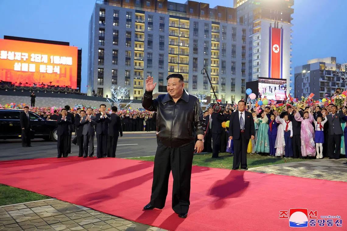 TOPSHOT - This picture taken on April 16, 2024 and released from North Korea's official Korean Central News Agency (KCNA) via KNS on April 17, 2024 shows North Korea's leader Kim Jong Un (C) taking part in a ceremony to mark the completion of the second phase of a 10,000-unit housing development in Pyongyang. (Photo by KCNA VIA KNS / AFP) / South Korea OUT / REPUBLIC OF KOREA OUT
---EDITORS NOTE--- RESTRICTED TO EDITORIAL USE - MANDATORY CREDIT "AFP PHOTO/KCNA VIA KNS" - NO MARKETING NO ADVERTISING CAMPAIGNS - DISTRIBUTED AS A SERVICE TO CLIENTS / THIS PICTURE WAS MADE AVAILABLE BY A THIRD PARTY. AFP CAN NOT INDEPENDENTLY VERIFY THE AUTHENTICITY, LOCATION, DATE AND CONTENT OF THIS IMAGE --- / 