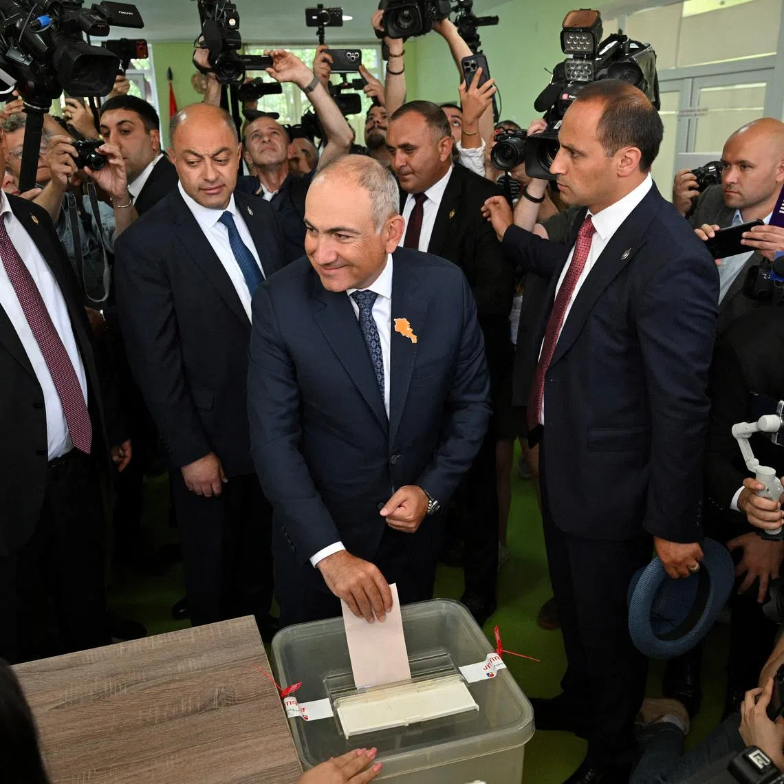 Armenian Prime Minister and leader of the Civil Contract party Nikol Pashinyan casts a ballot at a polling station during a parliamentary election in Yerevan, Armenia, June 7, 2026. Stringer/Photolure via REUTERS