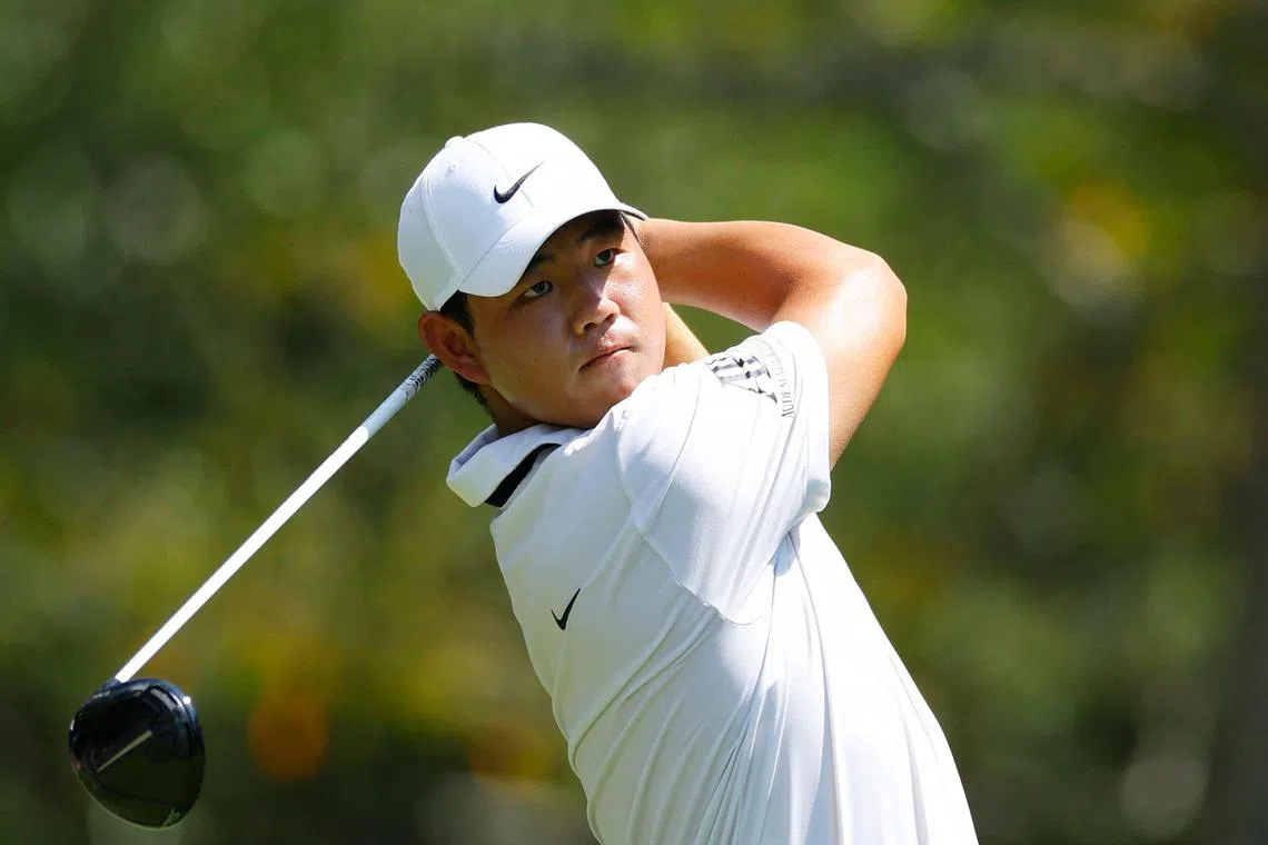 ATLANTA, GEORGIA - AUGUST 26: Tom Kim of South Korea plays his shot from the fifth tee during the third round of the TOUR Championship at East Lake Golf Club on August 26, 2023 in Atlanta, Georgia.   Mike Ehrmann/Getty Images/AFP (Photo by Mike Ehrmann / GETTY IMAGES NORTH AMERICA / Getty Images via AFP)