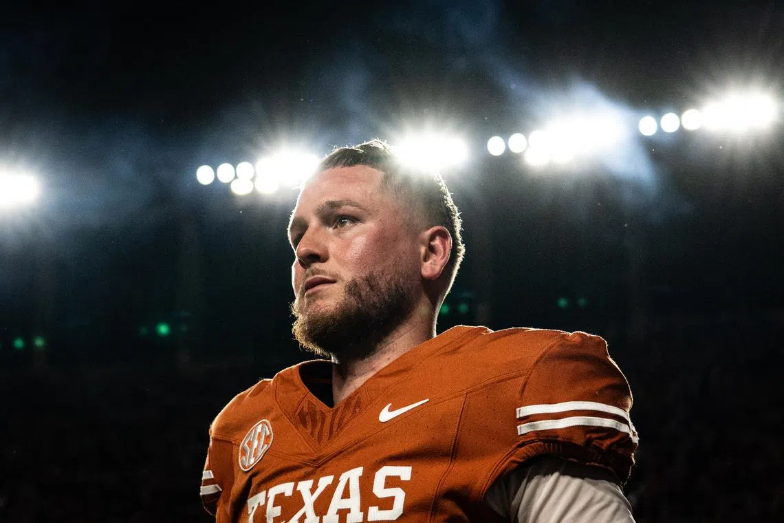 FILE PHOTO: Nov 23, 2024; Austin, Texas, USA; Texas Longhorns quarterback Quinn Ewers (3) looks over at the student section after aÕgame against the Kentucky Wildcats at Darrell K Royal Texas Memorial Stadium. Sara Diggins/USA TODAY Network via Imagn Images/File Photo