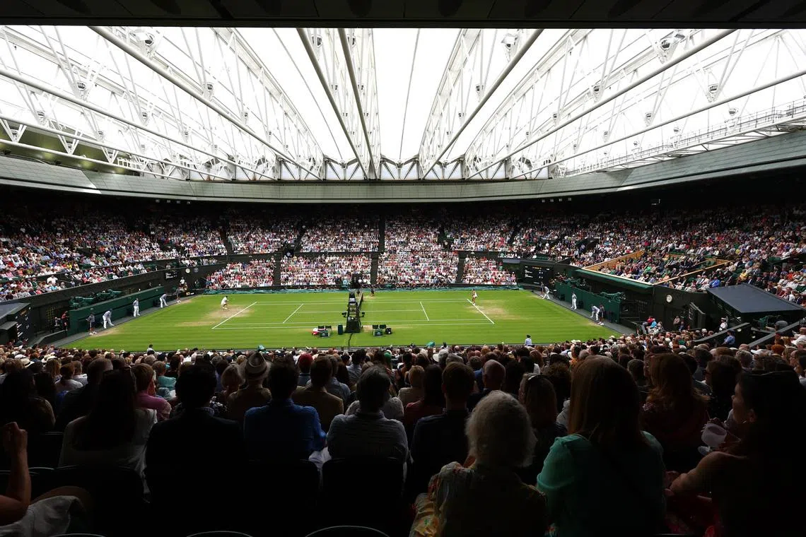 Tennis - Wimbledon - All England Lawn Tennis and Croquet Club, London, Britain - July 13, 2023 General view as spectators watch the semi final match between Tunisia’s Ons Jabeur and Belarus’ Aryna Sabalenka on centre court REUTERS/Toby Melville