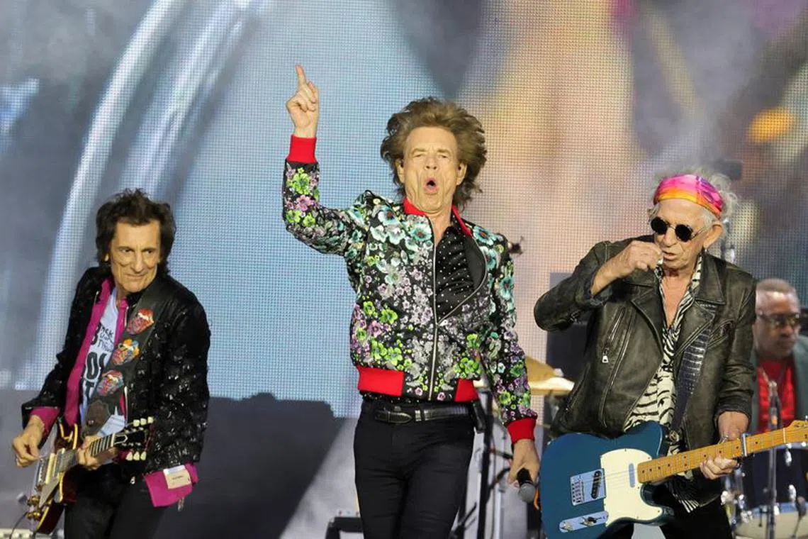 FILE PHOTO: Mick Jagger, Ronnie Wood and Keith Richards of The Rolling Stones perform as part of their \"Stones Sixty Europe 2022 Tour\", at the Hippodrome de Longchamp in Paris, France July 23, 2022. REUTERS/Pascal Rossignol/File Photo