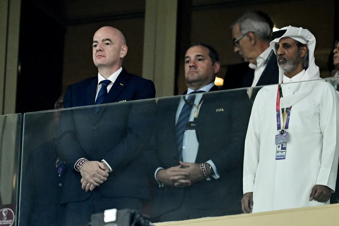 FILE PHOTO: Soccer Football - FIFA World Cup Qatar 2022 - Group H - Portugal v Uruguay - Lusail Stadium, Lusail, Qatar - November 28, 2022 FIFA president Gianni Infantino and President of the Qatar Football Association Sheikh Hamad bin Khalifa bin Ahmed Al Thani before the match REUTERS/Dylan Martinez/File Photo