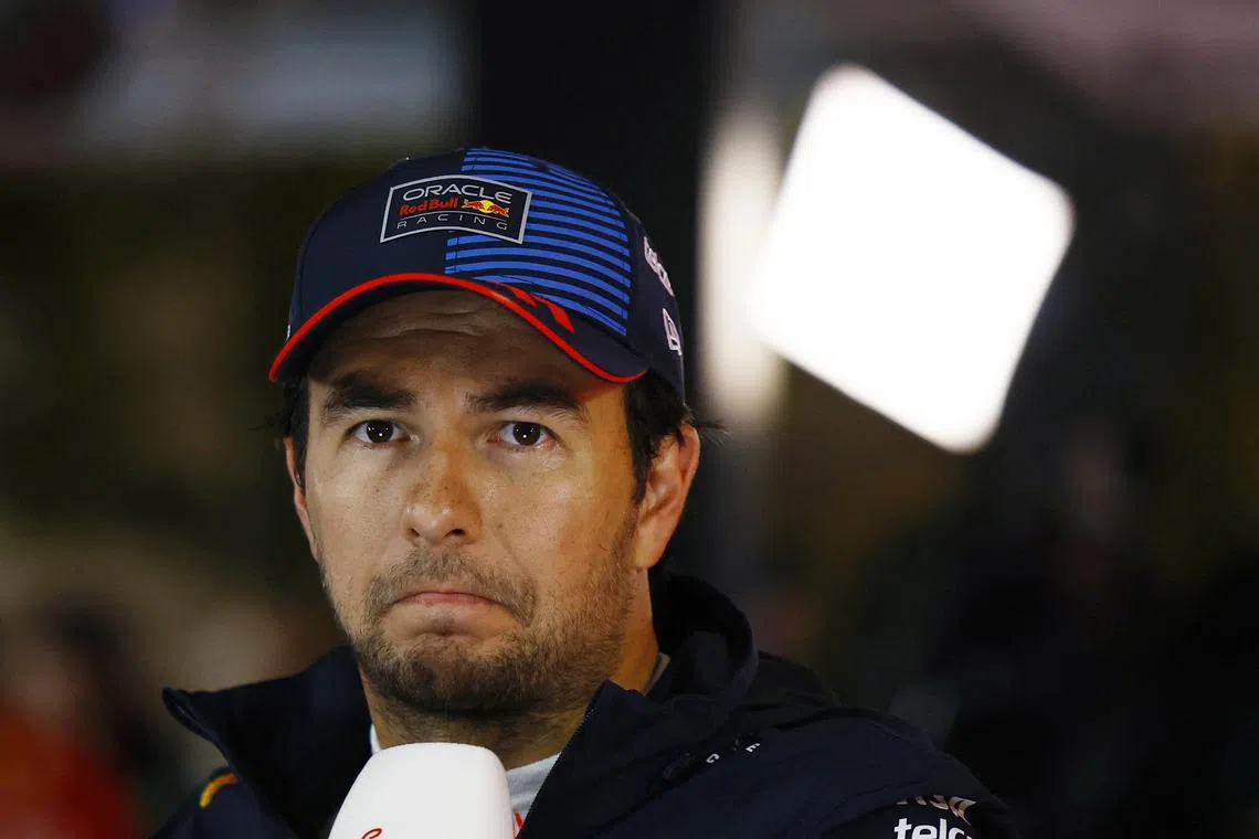 Red Bull's Sergio Perez looks dejected after qualifying in ninth place at the Qatar Grand Prix.