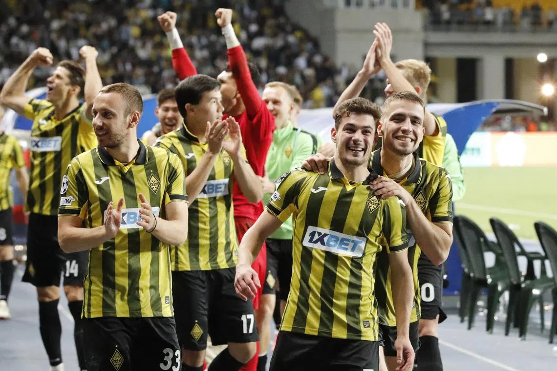 Soccer Football - UEFA Champions League - Play Off - Second Leg - Kairat v Celtic - Ortalyk Stadion, Almaty, Kazakhstan - August 27, 2025 Kairat's Jorginho and teammates celebrate after winning the penalty shootout and qualifying for the UEFA Champions League REUTERS/Pavel Mikheyev