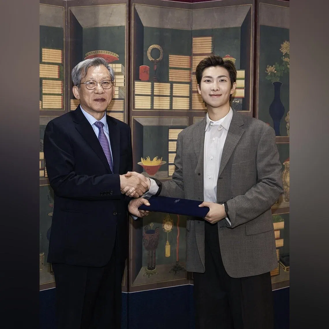 The National Museum of Korea announced the appointment of BTS leader RM (right) as its global ambassador on June 20.