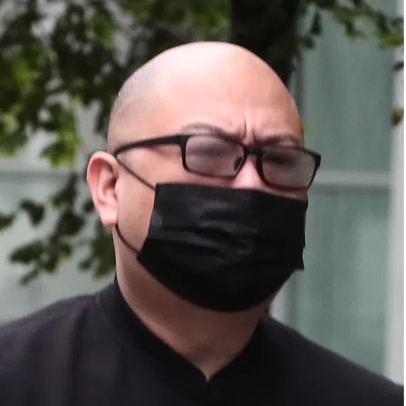 Home Affairs Minister K. Shanmugam (left) and Manpower Minister Tan See Leng (centre) were granted $210,000 in damages in defamation suits filed against The Online Citizen chief editor Terry Xu (right).