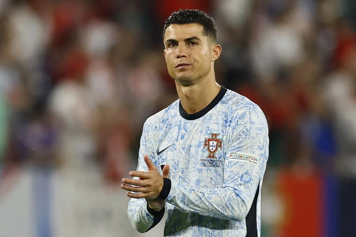 Soccer Football - Euro 2024 - Group F - Georgia v Portugal - Arena AufSchalke, Gelsenkirchen, Germany - June 26, 2024  Portugal's Cristiano Ronaldo looks dejected after the match REUTERS/Leon Kuegeler