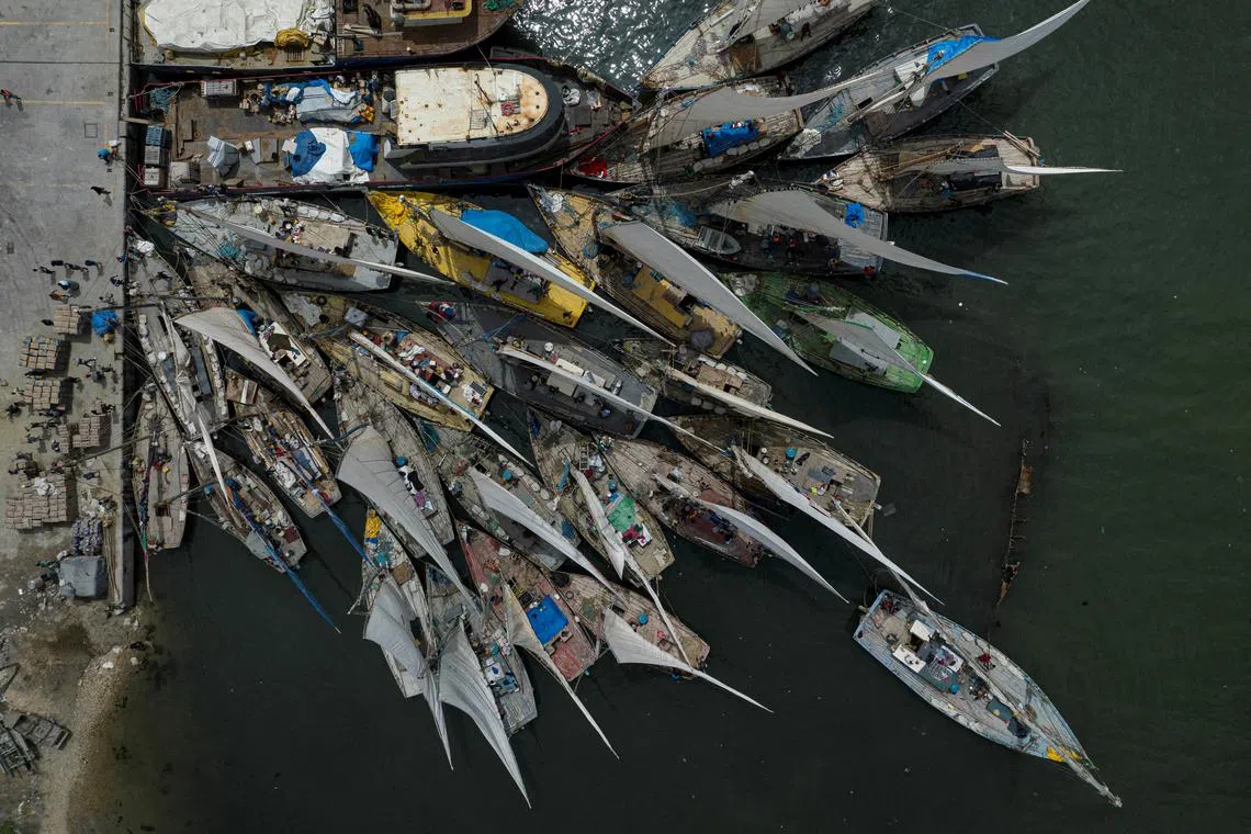 Wooden sailboats docked in Cap-Haitien, Haiti, on April 25, 2024. 