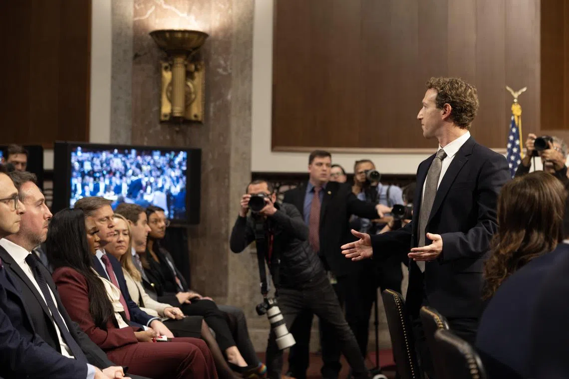 Meta chief Mark Zuckerberg (right) addresses families in the audience during a Senate hearing on protecting children from sexual exploitation online.