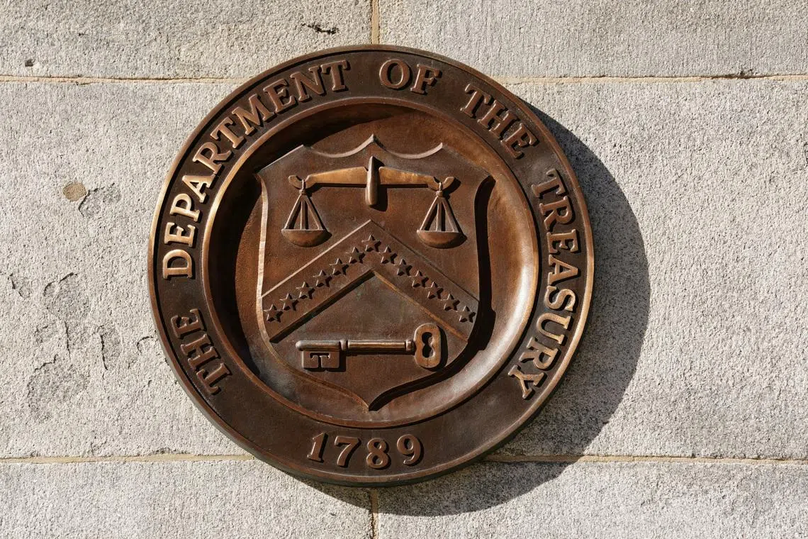 FILE PHOTO: A bronze seal for the Department of the Treasury is shown at the U.S. Treasury building in Washington, U.S., January 20, 2023.  REUTERS/Kevin Lamarque/File Photo