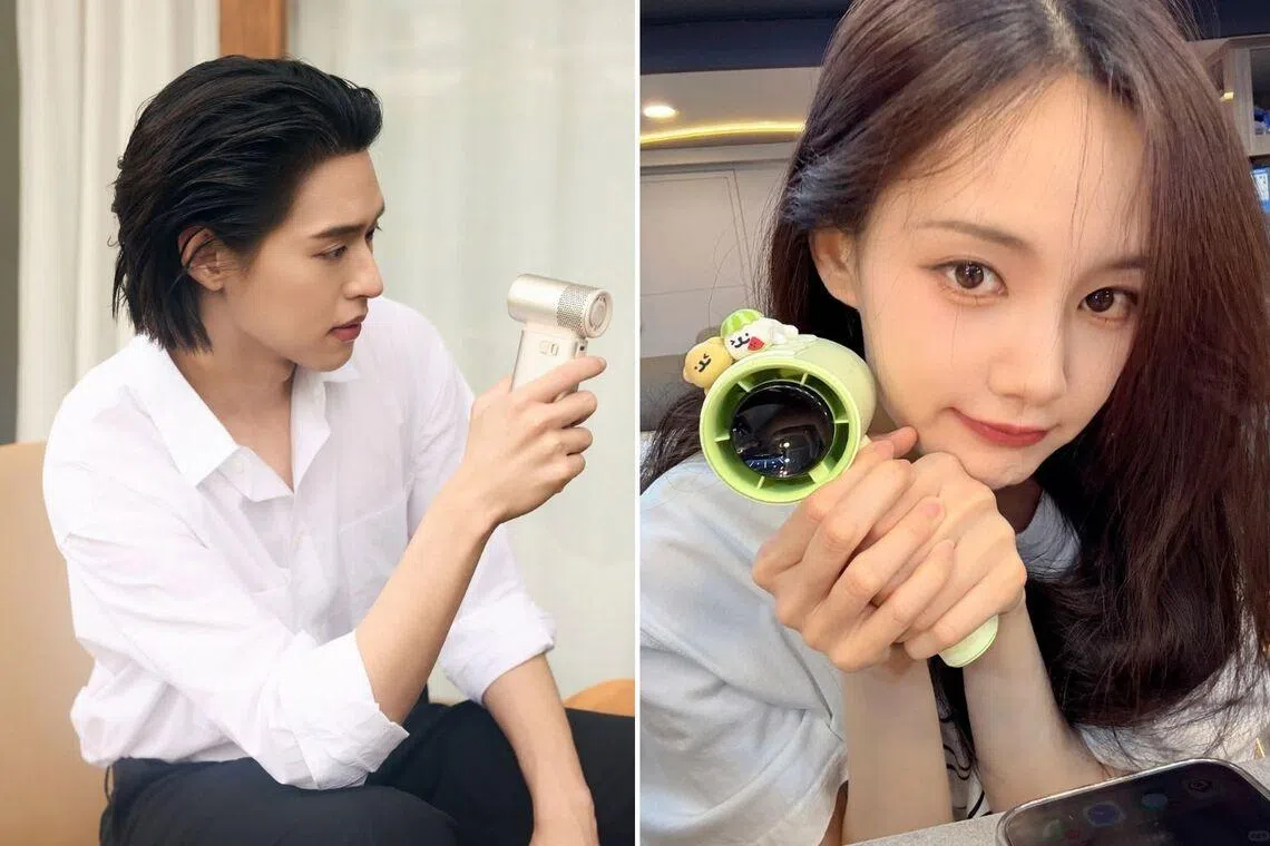 Thai actor Billkin Putthipong Assaratanakul, JisuLife’s former brand presenter for Thailand, and Chinese actress Li Yitong, the brand’s former regional ambassador in China, holding their JisuLife fans.