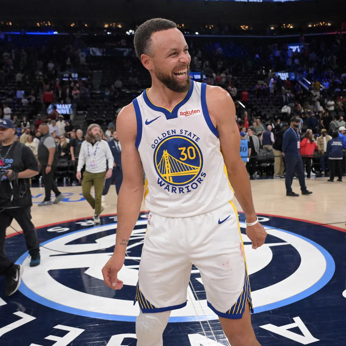 FILE PHOTO: Golden State Warriors guard Stephen Curry (30) smiles on the court after defeating the Los Angeles Clippers during the play-in rounds of the 2026 NBA Playoffs at Intuit Dome. Mandatory Credit: Jayne Kamin-Oncea-Imagn Images/File Photo