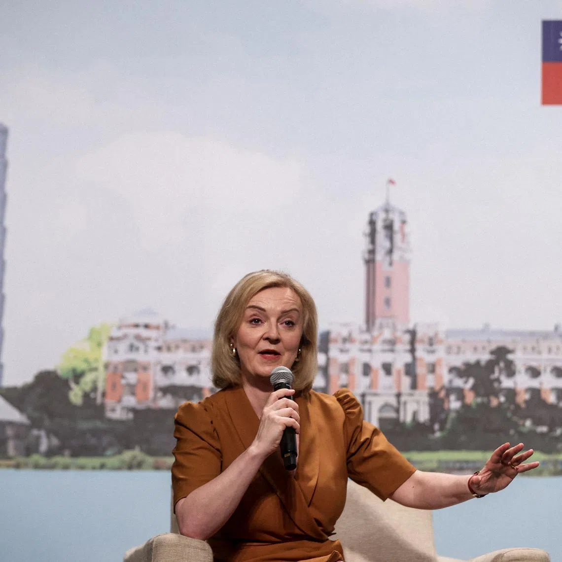 Former UK prime minister Liz Truss speaks during a press conference at the Grand Hyatt Taipei hotel as part of her five-day visit to Taiwan, in Taipei on May 17, 2023. (Photo by I-Hwa Cheng / AFP)