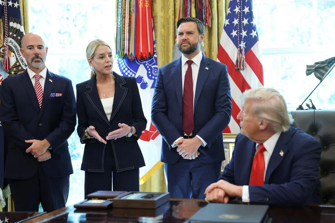 U.S. Attorney General Pam Bondi speaks next to U.S. Vice President JD Vance and Terry Cole, Administrator of the U.S. Drug Enforcement Administration (DEA), during the signing of executive orders by U.S. President Donald Trump in the Oval Office at the White House in Washington, D.C., U.S., August 25, 2025. REUTERS/Jonathan Ernst