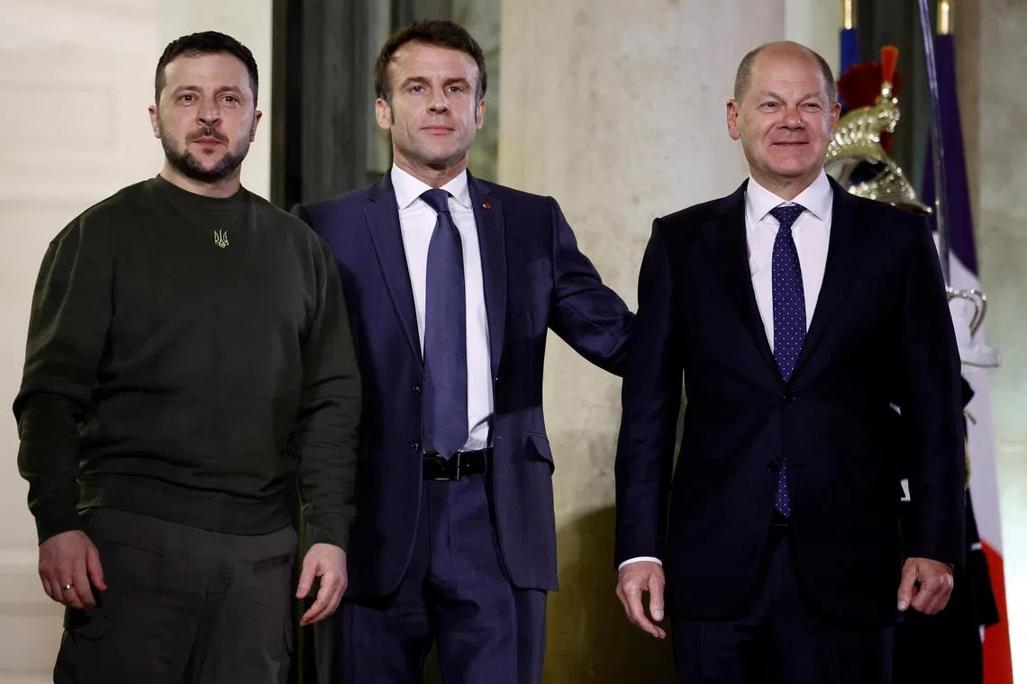 (From left) Ukraine's President Volodymyr Zelensky meets French President Emmanuel Macron and German Chancellor Olaf Scholz at the Elysee Palace in Paris, on Feb 8, 2023.