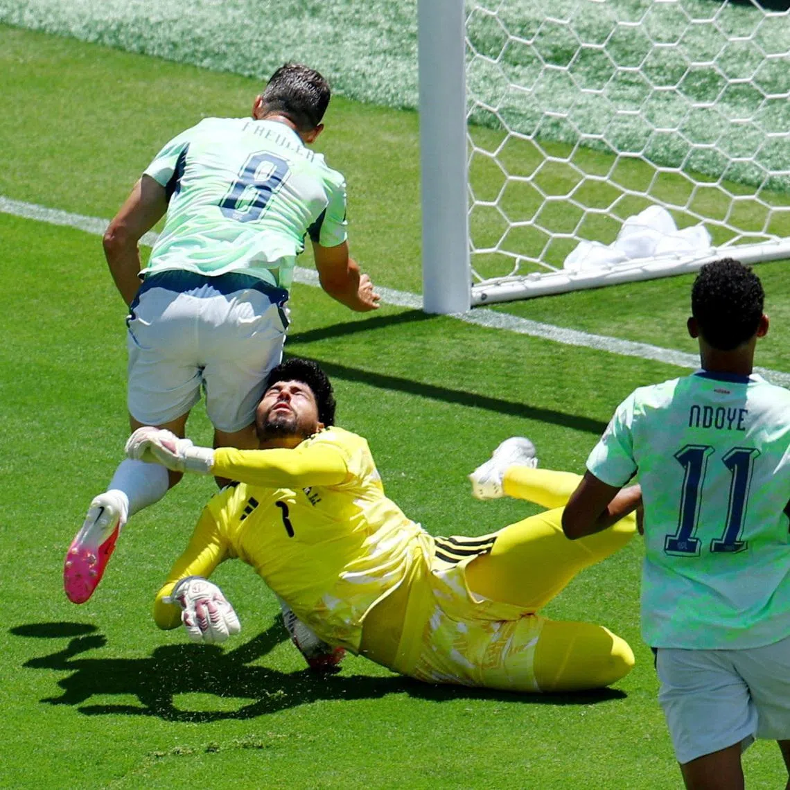 Soccer Football - FIFA World Cup 2026 - Group B - Qatar v Switzerland - San Francisco Bay Area Stadium, Santa Clara, California, U.S. - June 13, 2026 Qatar's Mahmoud Abunada fouls Switzerland's Remo Freuler to concede a penalty REUTERS/Eloisa Lopez