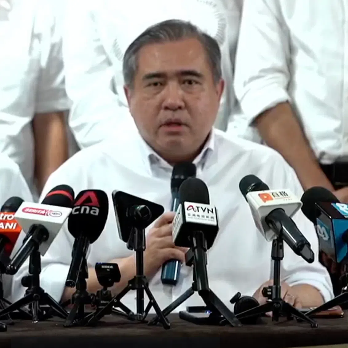 DAP secretary general Anthony Lok (centre, seated), flanked by DAP national chairman Gobind Singh Deo (left) and DAP national adviser Lim Guan Eng, at the DAP Headquarters on Sept 19.