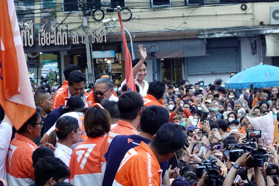 Move Forward Party leader Pita Limjaroenrat thanking supporters during the victory parade in Bangkok on May 15. 