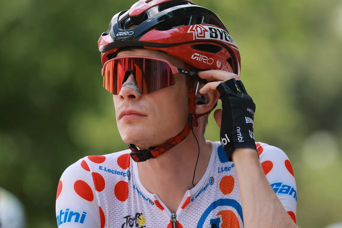 FILE PHOTO: Cycling - Tour de France - Stage 14 - Mulhouse to Le Markstein Fellering - Mulhouse, France - July 18, 2026 Team Visma | Lease a Bike's Jonas Vingegaard, wearing the polka-dot jersey, before the start of stage 14 REUTERS/Stephanie Lecocq/ File Photo