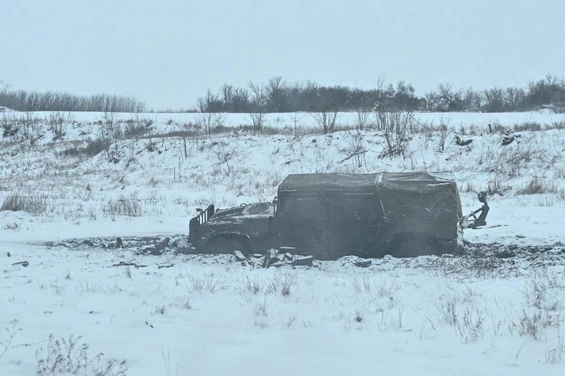 A Humvee of Ukrainian servicemen stuck in mud near a front line, amid Russia's attack on Ukraine, in Zaporizhzhia region, Ukraine January 16, 2026. REUTERS/Stringer