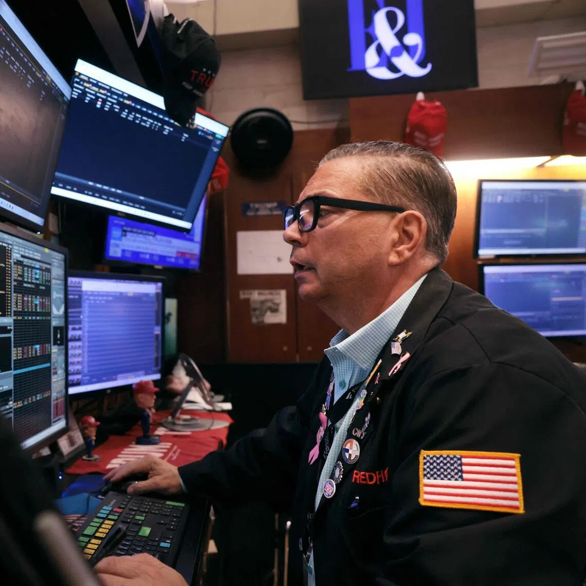 Traders working on the floor of the New York Stock Exchange on Sept 9, in New York City.