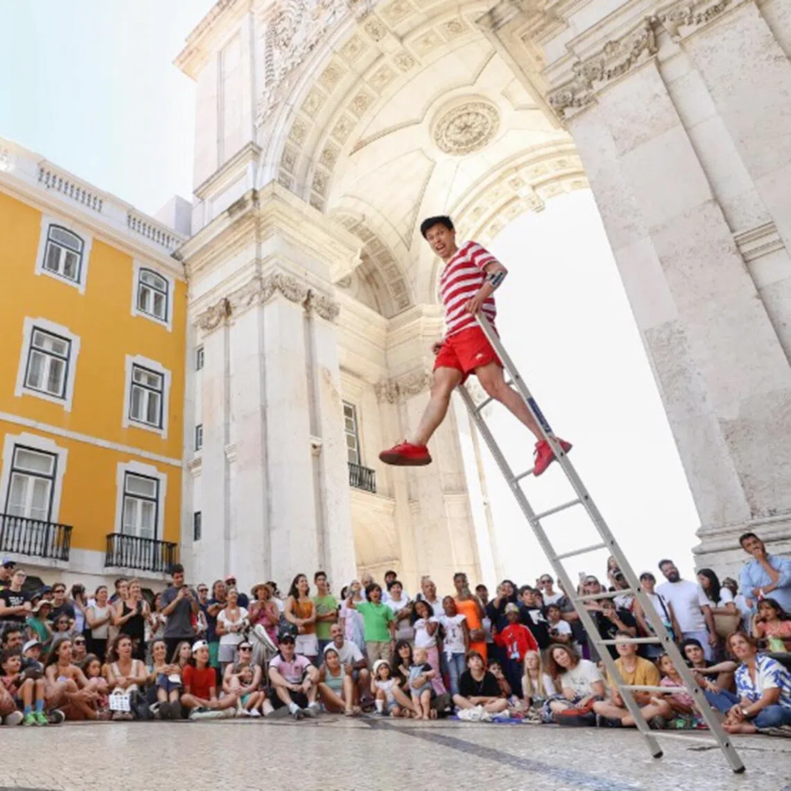 Singaporean circus performer Jonathan Goh in action during Lisboa Magica in Lisbon in August 2024.