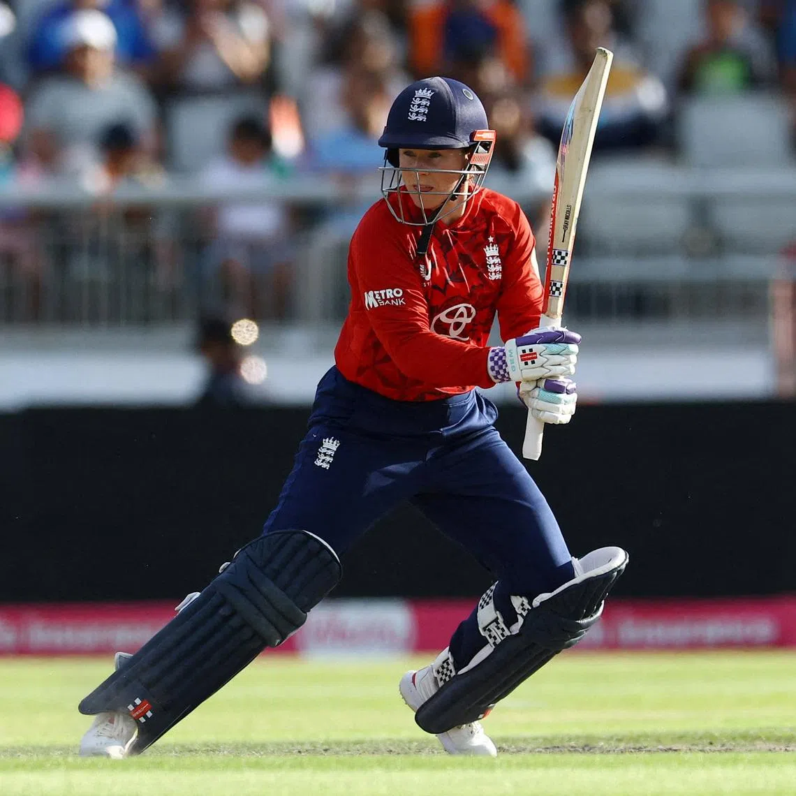 FILE PHOTO: Cricket - Fourth Women's Twenty20 International - England v India - Old Trafford Cricket Ground, Manchester, Britain - July 9, 2025 England's Tammy Beaumont in action Action Images via Reuters/Andrew Boyers/File Photo
