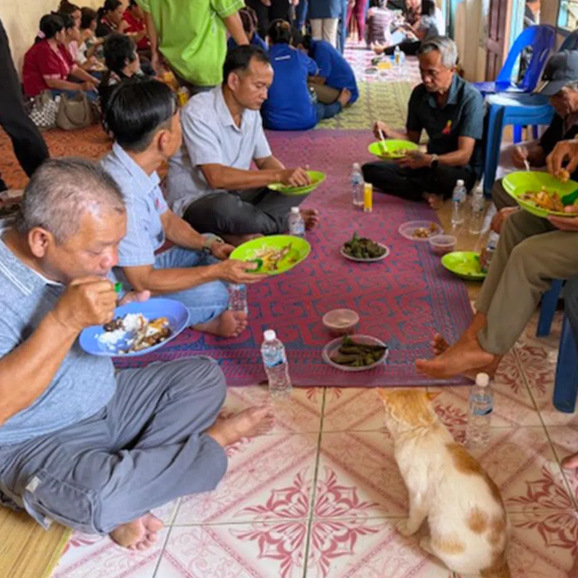 Guests of Rumah Intunie Ak Jiram in Nyato Atas, Lubok Antu, Sarawak, enjoying their lunch prepared by the host on Aug 18.