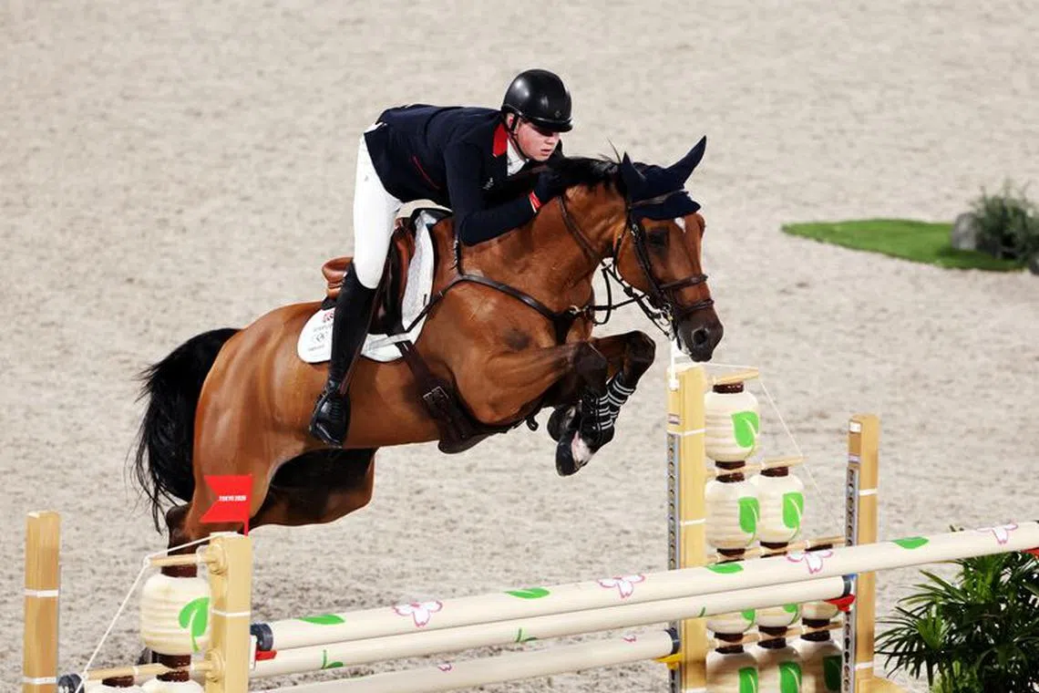 FILE PHOTO: Tokyo 2020 Olympics - Equestrian - Jumping - Individual - Final - Equestrian Park - Tokyo, Japan - August 4, 2021. Harry Charles of Britain on his horse Romeo 88 competes. REUTERS/Alkis Konstantinidis/File Photo