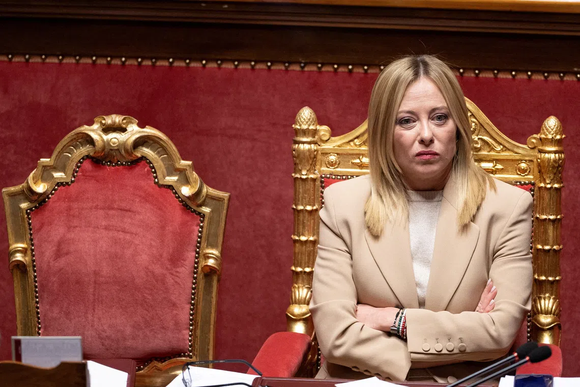 FILE PHOTO: Italy's Prime Minister Giorgia Meloni looks on as she appears at the Senate, ahead of the European Council in Brussels, in Rome, Italy, October 22, 2025. REUTERS/Remo Casilli/File Photo