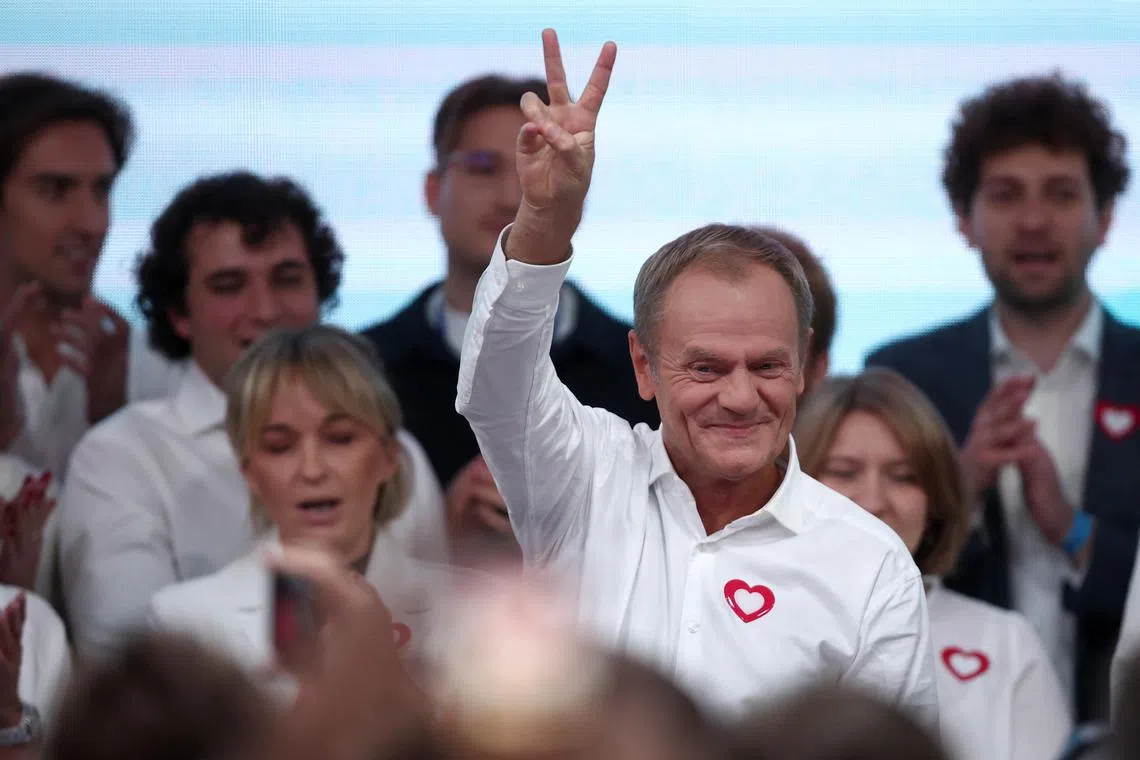 Civic Coalition leader Donald Tusk - a former European Council president - speaks during an election night rally in Warsaw.