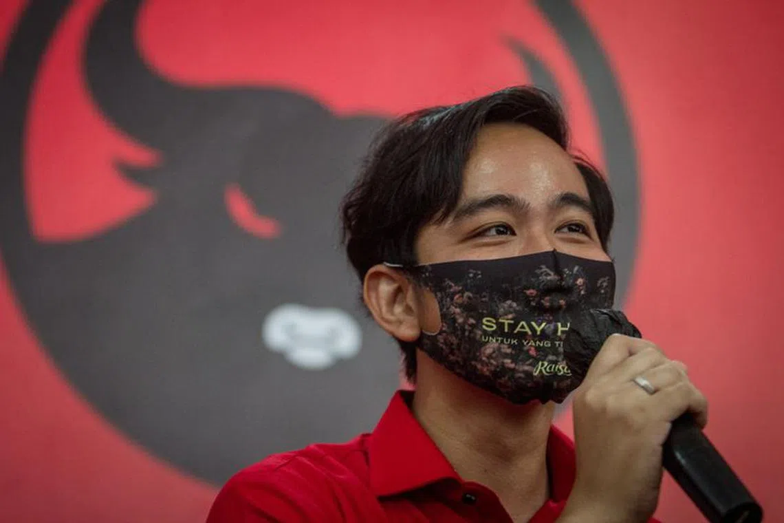 Surakarta mayoral candidate Gibran Rakabuming Raka, the eldest son of President Joko Widodo, speaks to journalists in Solo, Central Java Province, Indonesia, July 17, 2020. Picture taken July 17, 2020 in this photo taken by Antara Foto/Mohammad Ayudha via REUTERS/File Photo