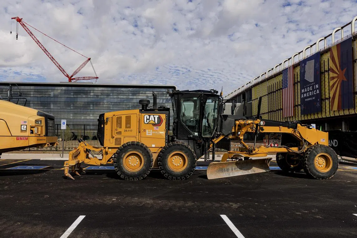 Construction equipment is staged ahead of President Joe Biden’s scheduled visit at the Taiwan Semiconductor Manufacturing Company (TSMC) in Phoenix in December last year. The Senate Finance Committee on Thursday passed a bill that would deepen economic ties between the US and Taiwan and effectively create a tax treaty that is expected to pave the way for more Taiwanese investment in the American semiconductor industry.