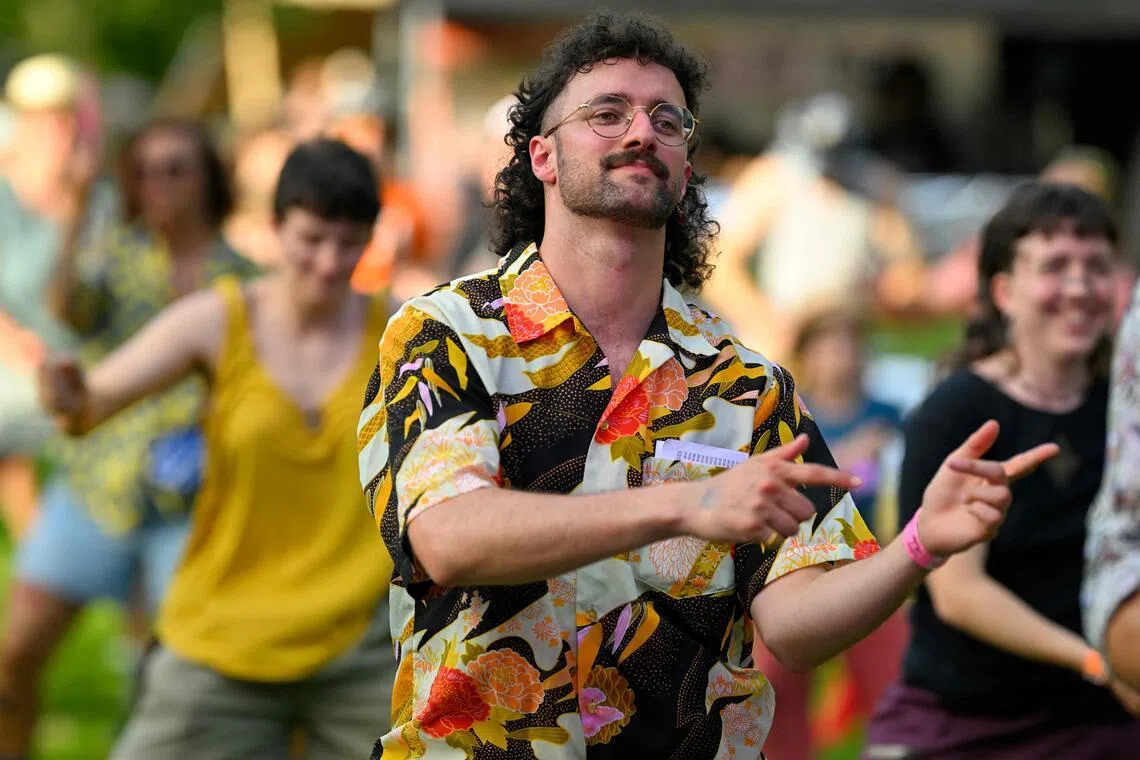 People take part in the annual European Mullet Cup in Belgium on May 23.