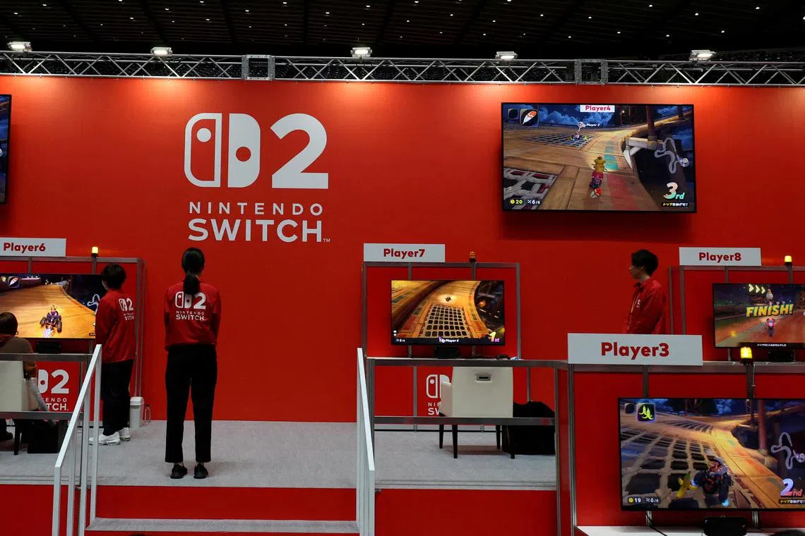 An attendee plays with the Nintendo Switch 2 gaming device at a media event in Tokyo on April 3.