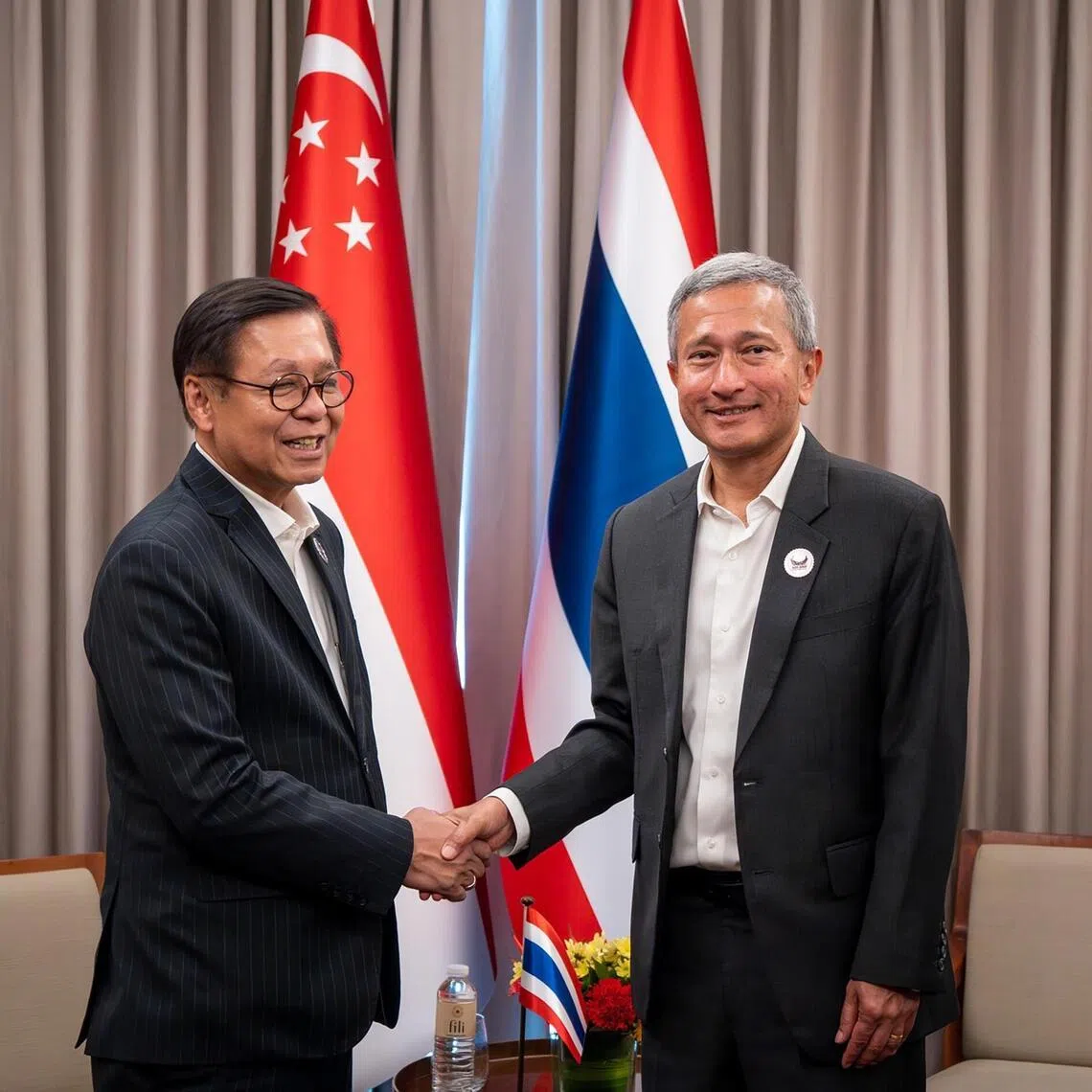 Foreign Minister Vivian Balakrishnan (right) meeting his Thai counterpart, Mr Sihasak Phuangketkeow, on the sidelines of the ASEAN Foreign Ministers’ Meeting in Cebu City, the Philippines, on Jan 28.
