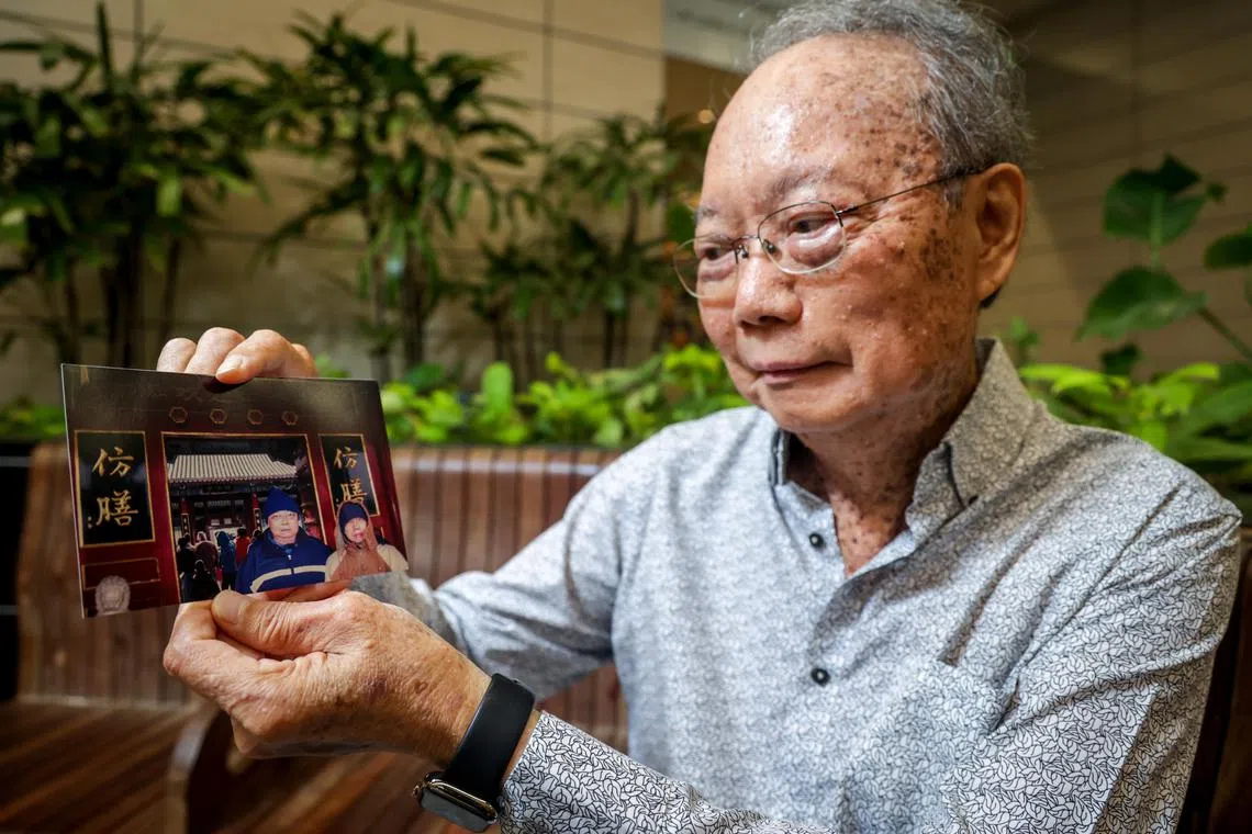 Mr Kong Fook Seng, 70, with a photo of himself and his late father Kong Wing Hing, on a trip to China. Mr Kong received a kidney from his father more than 40 years ago and continues to remain in relatively good health today.