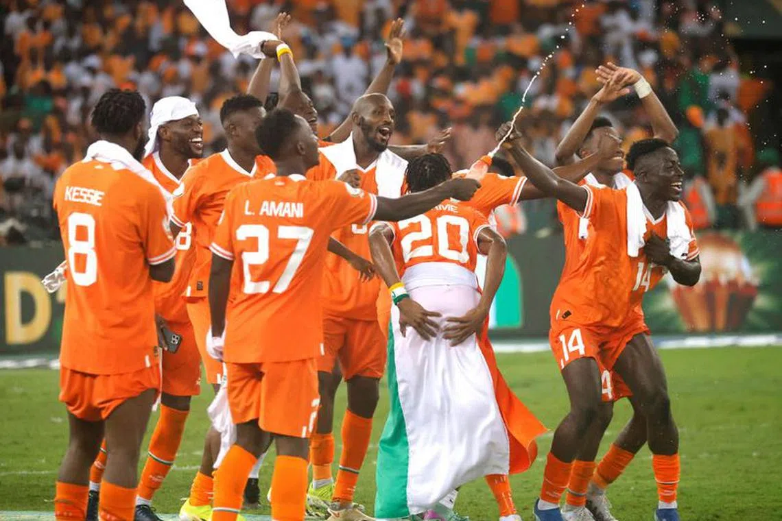 Soccer Football - Africa Cup of Nations - Final - Nigeria v Ivory Coast - Stade Olympique Alassane Ouattara, Abidjan, Ivory Coast - February 11, 2024 Ivory Coast players celebrate after the match REUTERS/Luc Gnago/ File photo