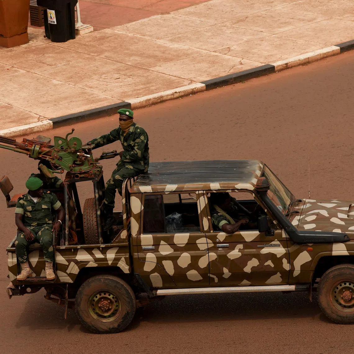 Soldiers patrol near the presidential palace in Bissau, Guinea-Bissau, November 21, 2025. REUTERS/Luc Gnago