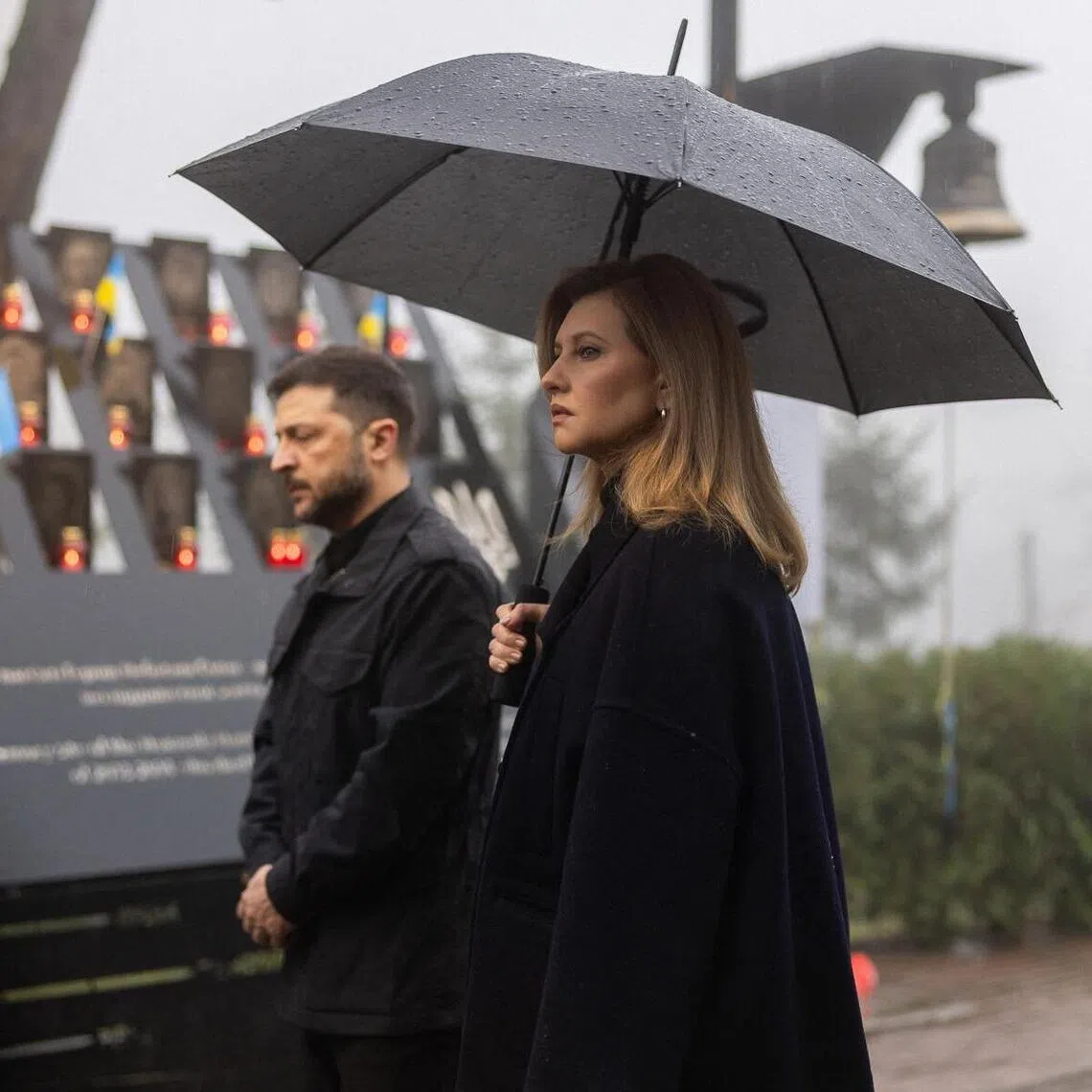 Ukrainian President Volodymyr Zelensky (left) and Ukrainian First Lady Olena Zelenska paying tribute on Nov 21 to demonstrators killed during freedom protests in Ukraine.