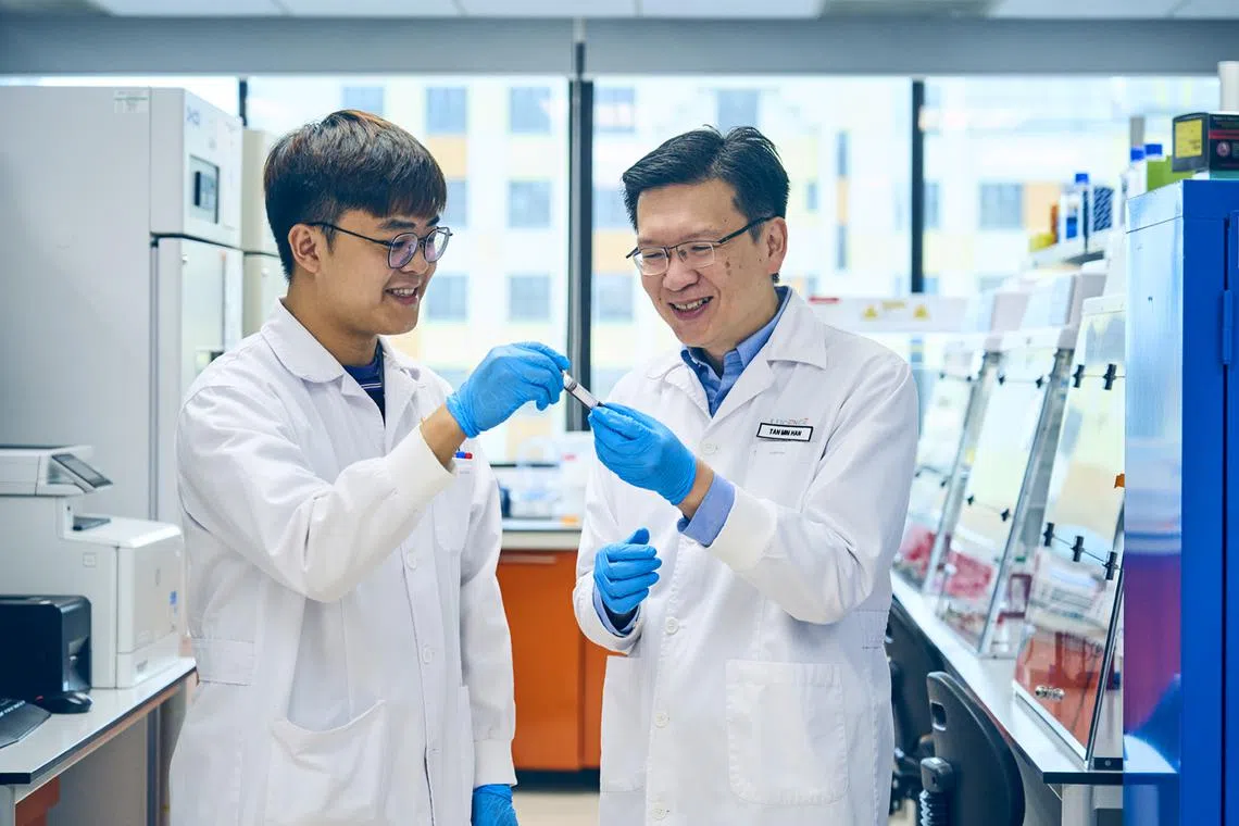 Despite being a precision medicine start-up, Lucence, founded by Dr Tan Min-Han (right, pictured with medical technologist Siah Sheng Keat), is competing with established healthcare firms in the US, and has even secured Medicare approval for one of its liquid biopsy tests. 