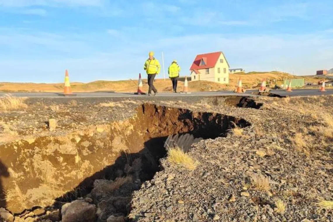 Cracks emerged on a road due to volcanic activity, near Grindavik, Iceland.