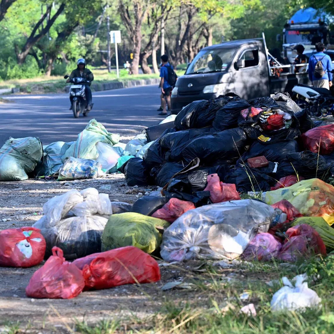 Rubbish piles up on a street in Denpasar on Indonesia's resort island of Bali on April 24.