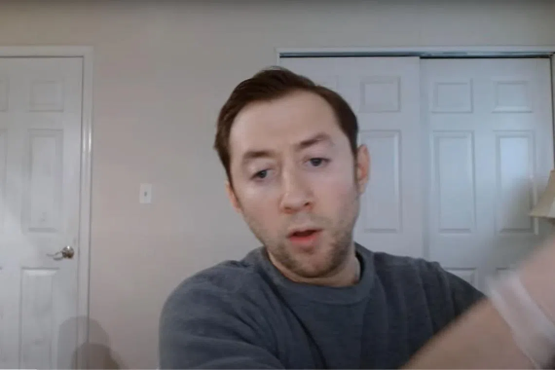 Justin Mohn pulling out what appears to be a human head just seconds into his YouTube video.