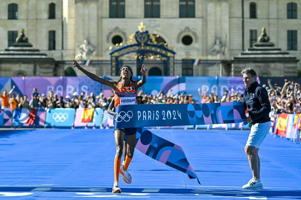Netherlands' Sifan Hassan crosses the finish line in first place in the women's marathon at the Paris 2024 Olympic Games.