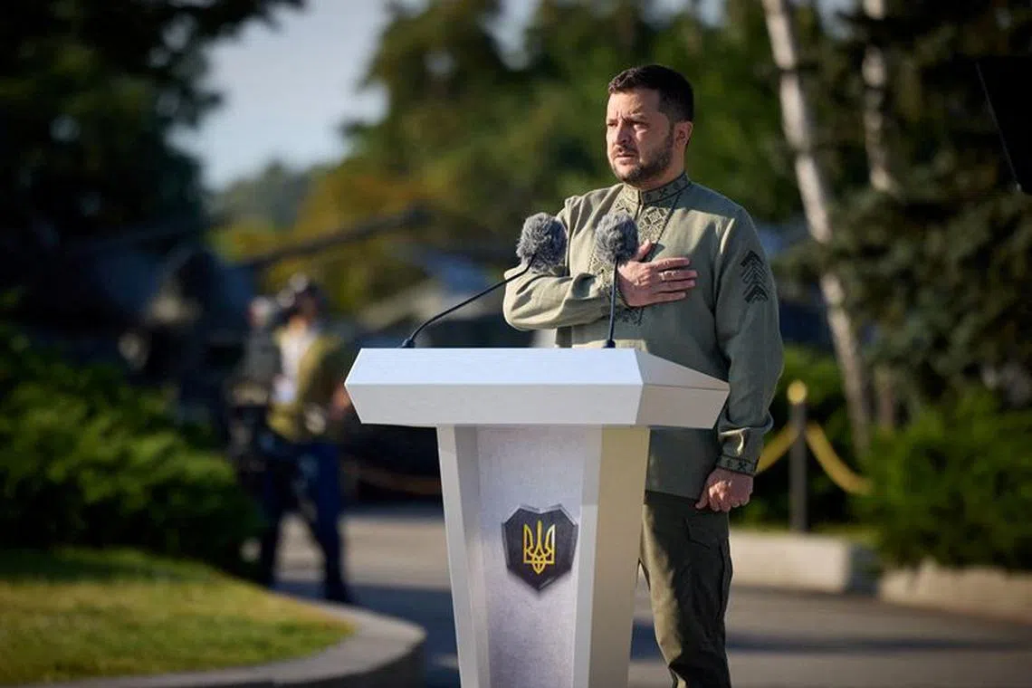 FILE PHOTO: Ukrainian President Volodymyr Zelenskiy attends a ceremony for the raising of Ukraine's biggest national flag to mark the Day of the State Flag, amid Russia's attack on Ukraine, in Kyiv, Ukraine August 23, 2023. Ukrainian Presidential Press Service/Handout via REUTERS