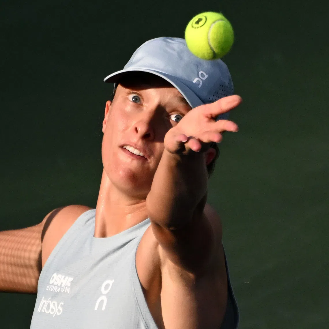 Aug 13, 2026; Toronto, Ontario, Canada; Iga Swiatek (POL) serves against Elena Rybakina (KAZ) during final round play at Sobeys Stadium. Mandatory Credit: Dan Hamilton-Imagn Images