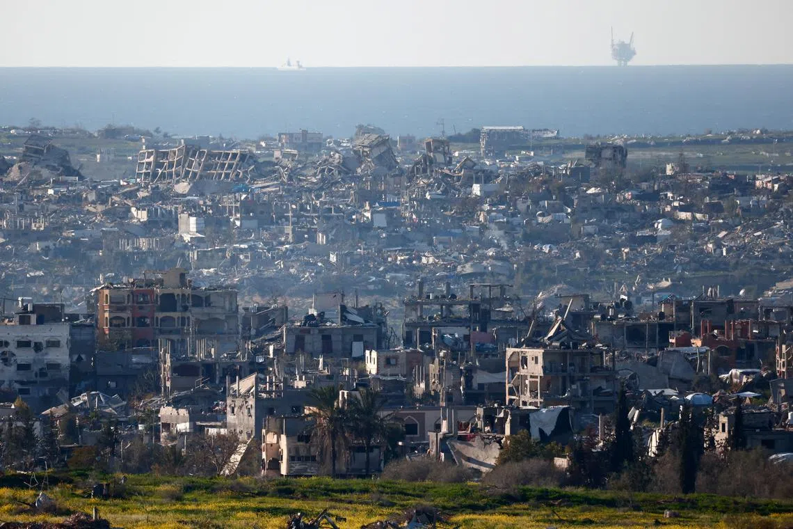 Damaged buildings in north Gaza. Some Singaporeans have called for Singapore to go beyond providing humanitarian assistance to Gaza.